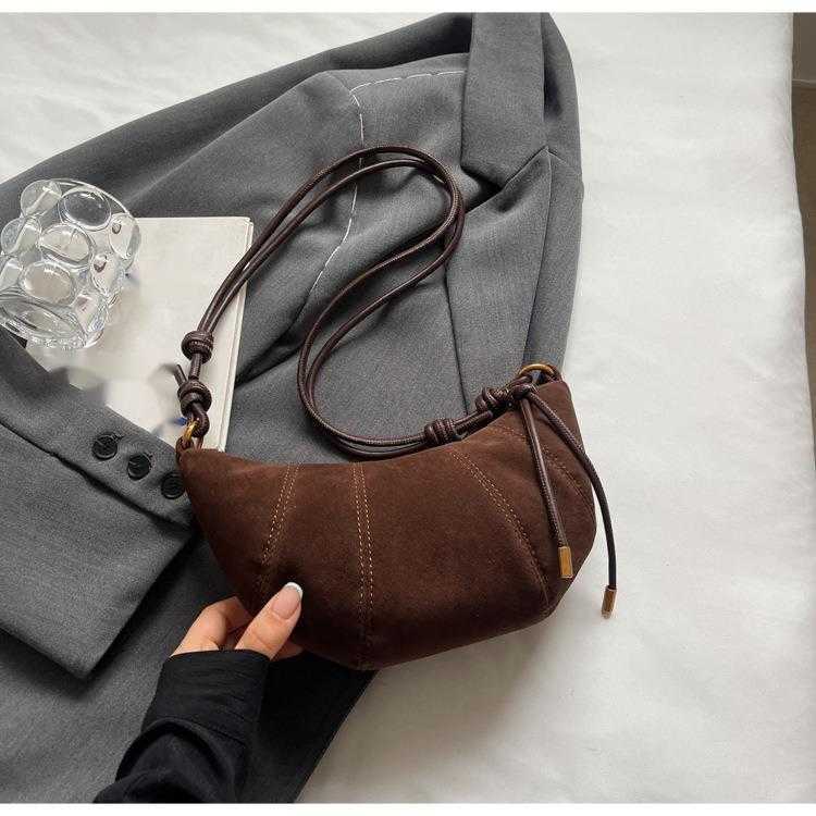 CMM Korean Niche Cow Horn Dumpling Bag Womens Bag New Texture Frosted Crossbody Bag Daily Commuting Phone Bag