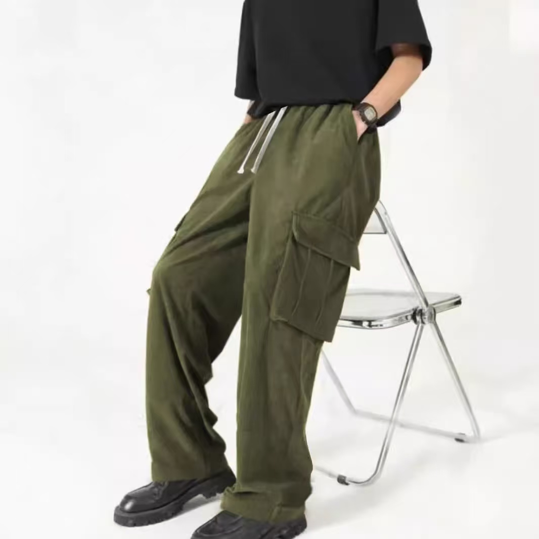 Men's new hot European and American fashion and leisure sports corduroy multi-bag overalls trousers.