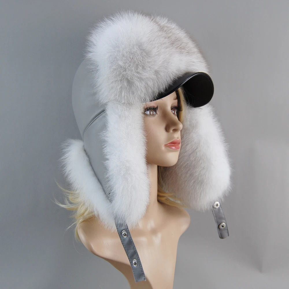 A genuine silver fox fur hat with ear flaps a genuine natural fur hat suitable for Russian womens bomber hats and a trap hat with a genuine leather to