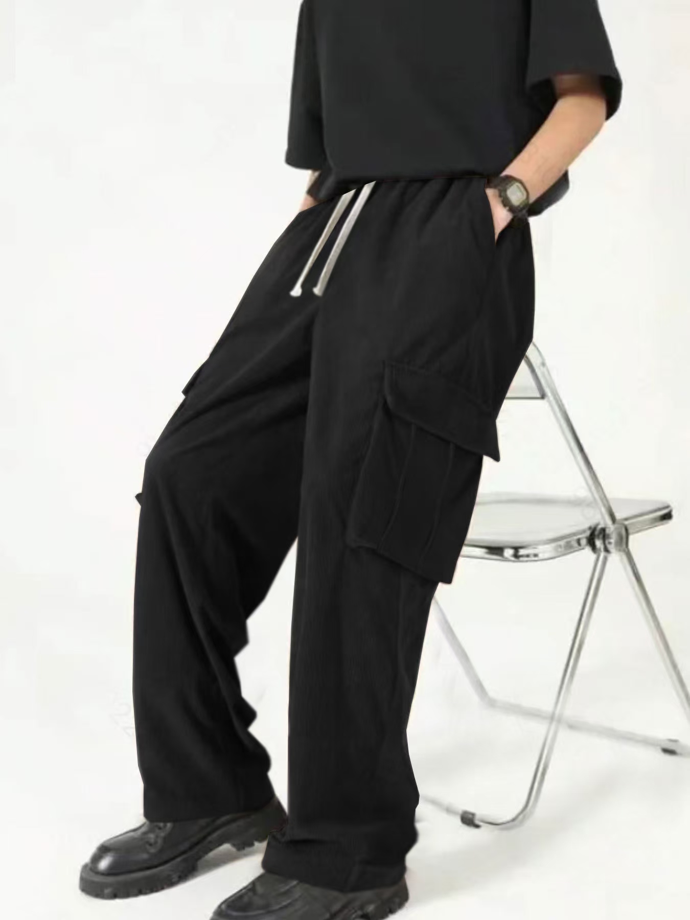 Men's new hot European and American fashion and leisure sports corduroy multi-bag overalls trousers.