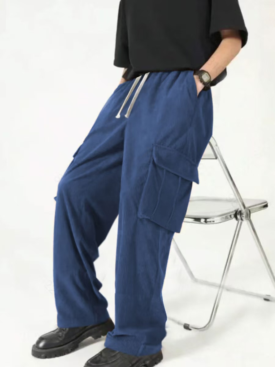 Men's new hot European and American fashion and leisure sports corduroy multi-bag overalls trousers.