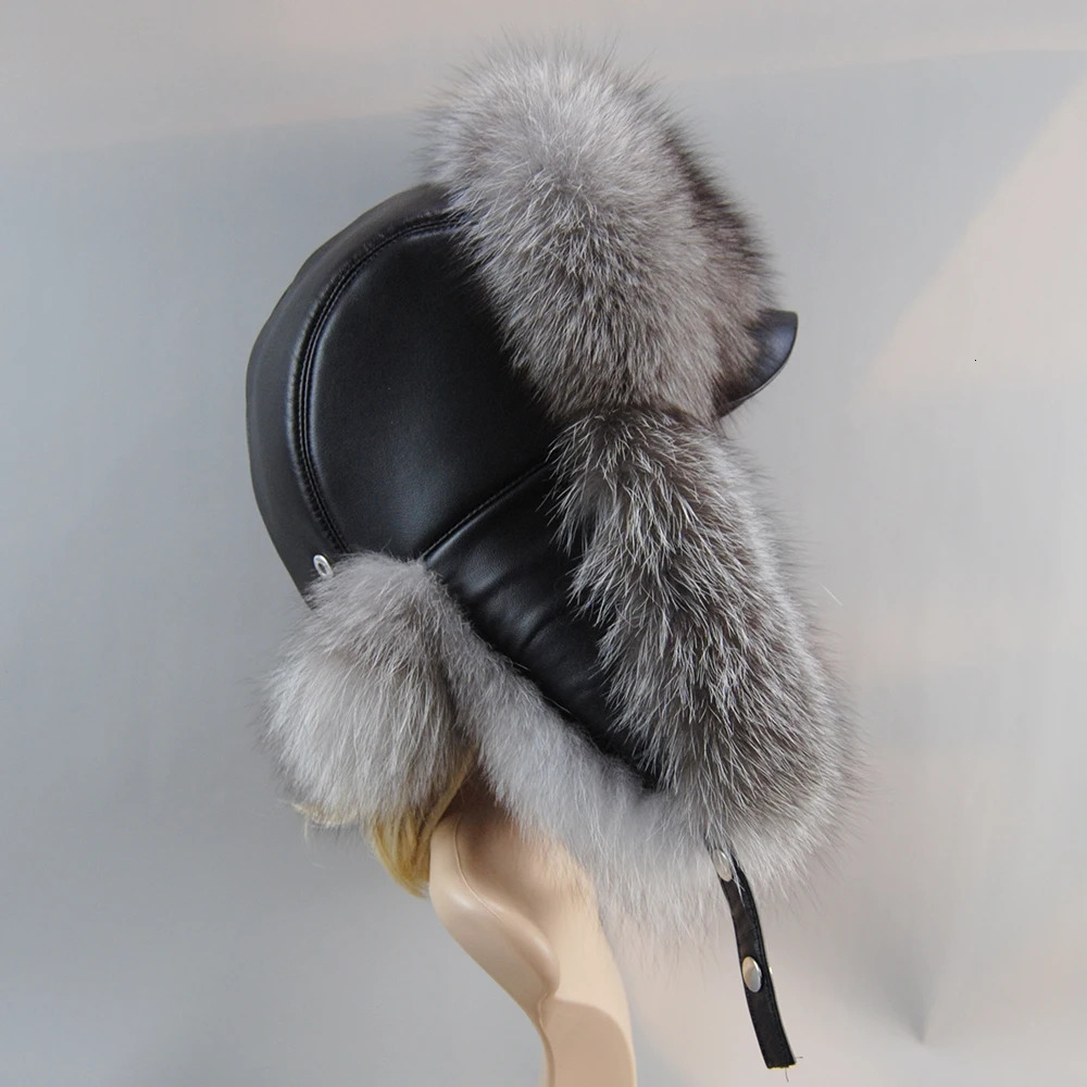 A genuine silver fox fur hat with ear flaps a genuine natural fur hat suitable for Russian womens bomber hats and a trap hat with a genuine leather to