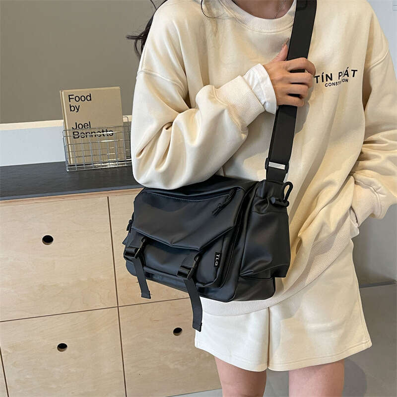 2024 new functional men large capacity highend single shoulder crossbody bag simple anti splash mailman bag for women and men