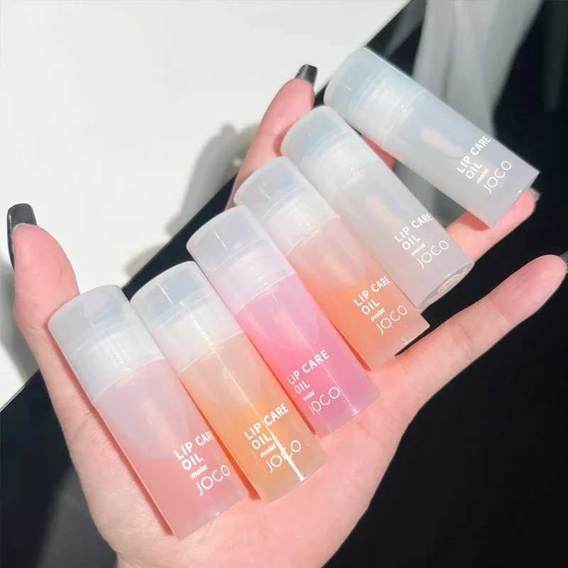 Transparent lipstick glass lip gloss perfume non stick moisturizing lip coloring lip fullness lip care serum primer large brush head W241101