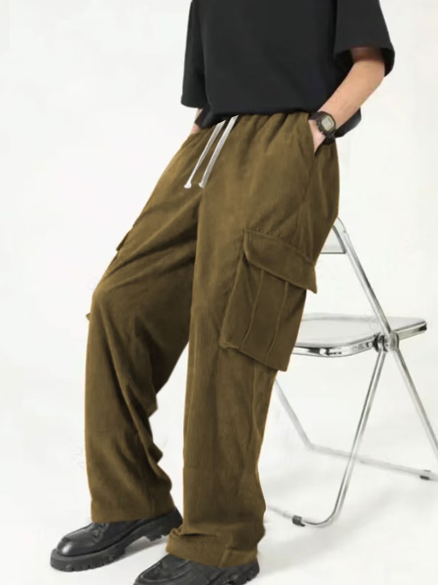 Men's new hot European and American fashion and leisure sports corduroy multi-bag overalls trousers.