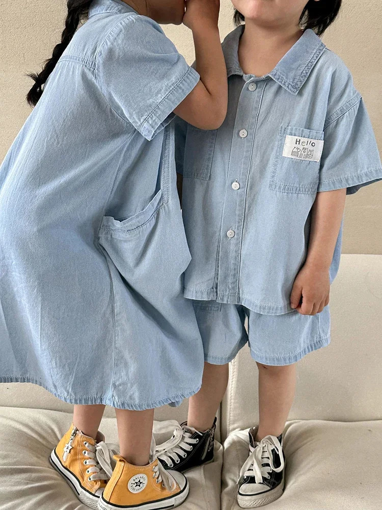 Cute Childrens Denim Suit 2024 Summer Korean Fashion Loose Short Sleeves Tops Shorts 2pcs Toddler Cotton Tees Suit Solid Color 240323