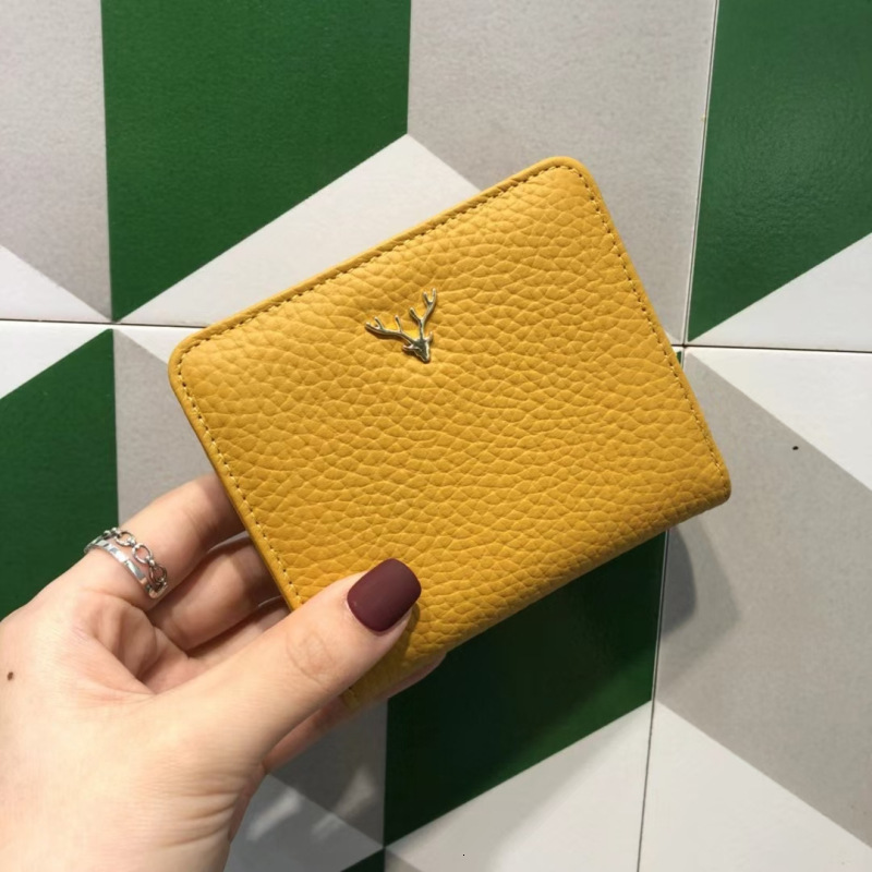 New designer cowhide women's wallet ultra-thin, compact and chic Christmas deer buckle women's genuine leather card clip wallet coin wallet
