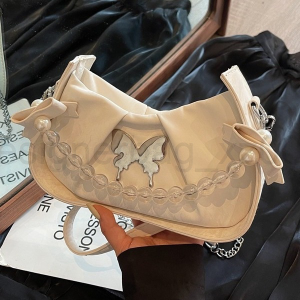 Classic Designer Bag Fashion 10a Top Woman Handbagfashion Canvas Bags French Niche Design Womens Butterfly New Style Stylish and Versatile Chain Cross