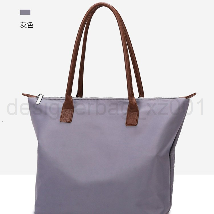 Bag Designer Fashion Classic 10a Top Woman Handbagevening Bags New Minimalist Womens Handbag Tote Versatile Waterproof Oxford Cloth Shoulder Armpit