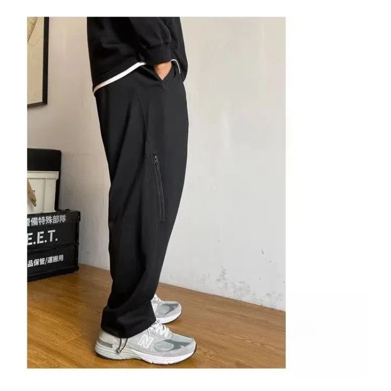 Spring and autumn mens solid color elastic high waist pocket zipper casual fashion goods drawstring pants 241030