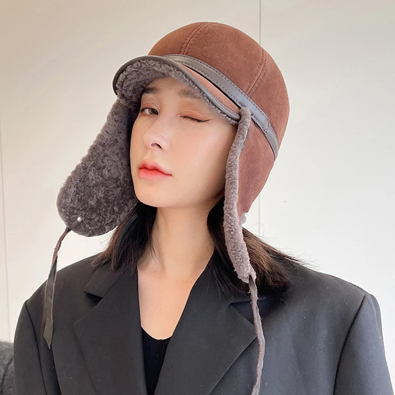 high-quality winter leather hat womens fur Lambswool warm thick ear flap bomber hat womens baseball hat Russian hat 241031