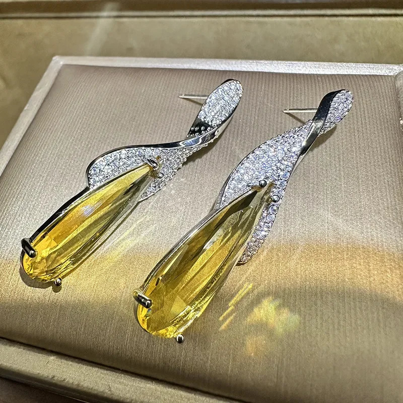 Yellow crystal large water droplet pendant earrings suitable for womens birthday parties banquet dress accessories perforated needles Christmas gifts 