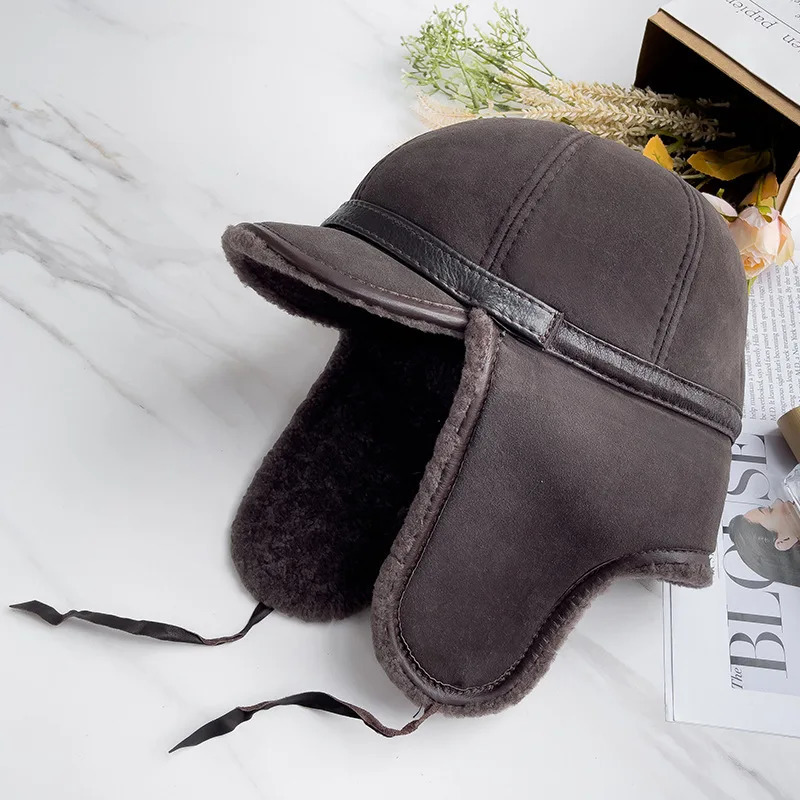 Real fur wool hat for men in winter warm bomber Russian Usanka hat with ear flaps cowhide thick snow earrings baseball cap 241031