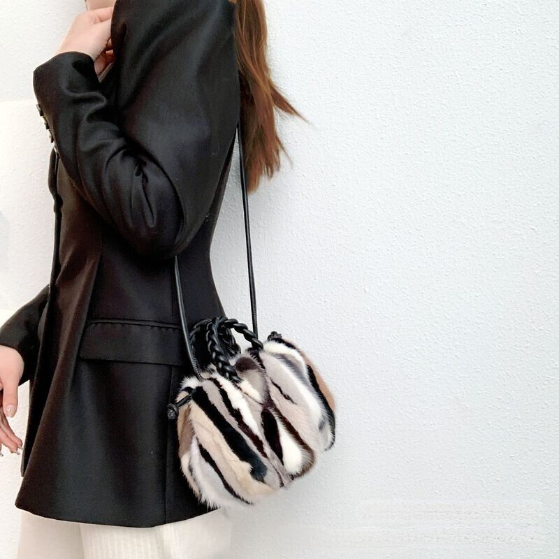 2025 mink fur patchwork color pumpkin bag fashionable women's shoulder bag can be slung diagonally real fur grass designer handbag