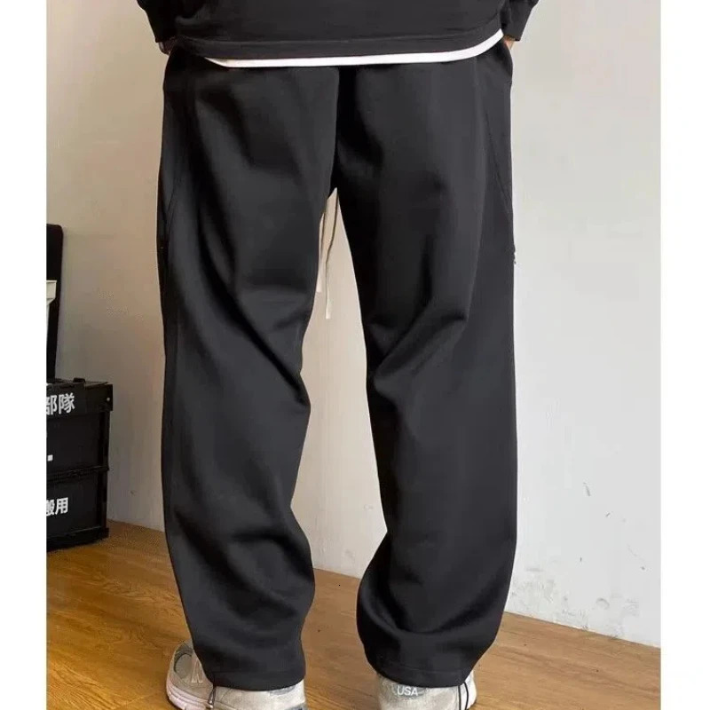 Spring and autumn mens solid color elastic high waist pocket zipper casual fashion goods drawstring pants 241030