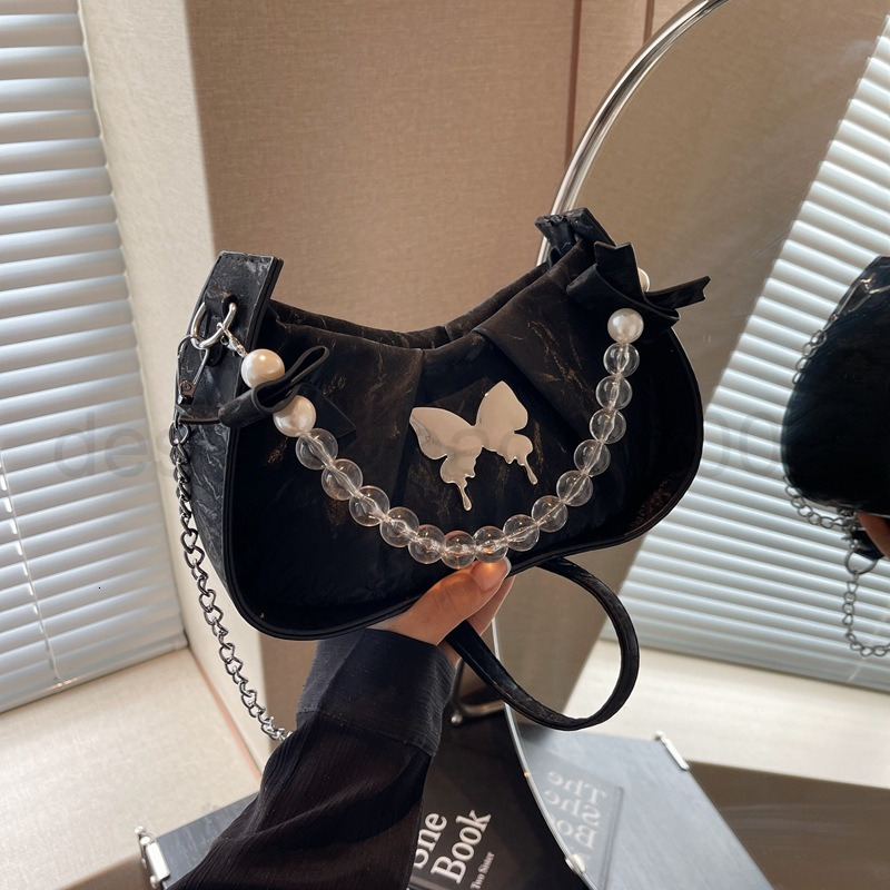 Classic Designer Bag Fashion 10a Top Woman Handbagfashion Canvas Bags French Niche Design Womens Butterfly New Style Stylish and Versatile Chain Cross
