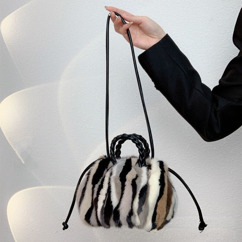 2025 mink fur patchwork color pumpkin bag fashionable women's shoulder bag can be slung diagonally real fur grass designer handbag