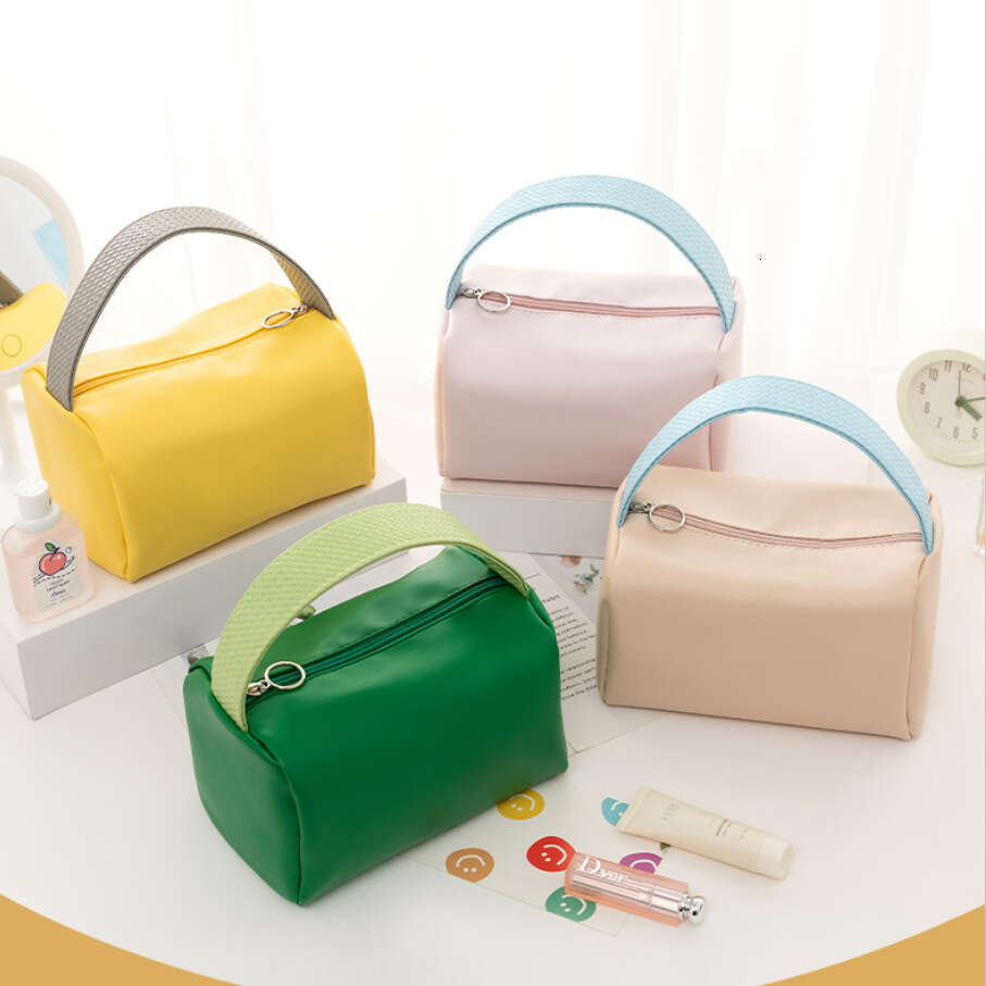 Candy Colored PU Waterproof Travel Toiletry Bag with Large Capacity for Handheld Use