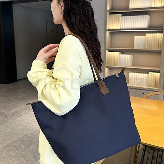 Bag Designer Fashion Classic 10a Top Woman Handbagevening Bags New Minimalist Womens Handbag Tote Versatile Waterproof Oxford Cloth Shoulder Armpit