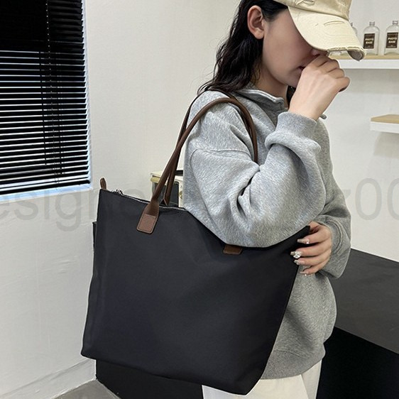 Bag Designer Fashion Classic 10a Top Woman Handbagevening Bags New Minimalist Womens Handbag Tote Versatile Waterproof Oxford Cloth Shoulder Armpit