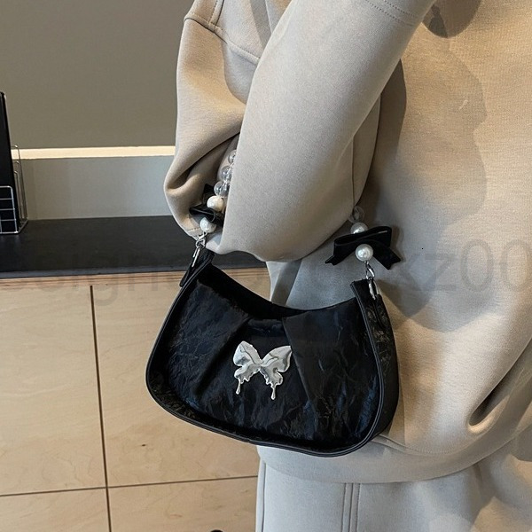 Classic Designer Bag Fashion 10a Top Woman Handbagfashion Canvas Bags French Niche Design Womens Butterfly New Style Stylish and Versatile Chain Cross
