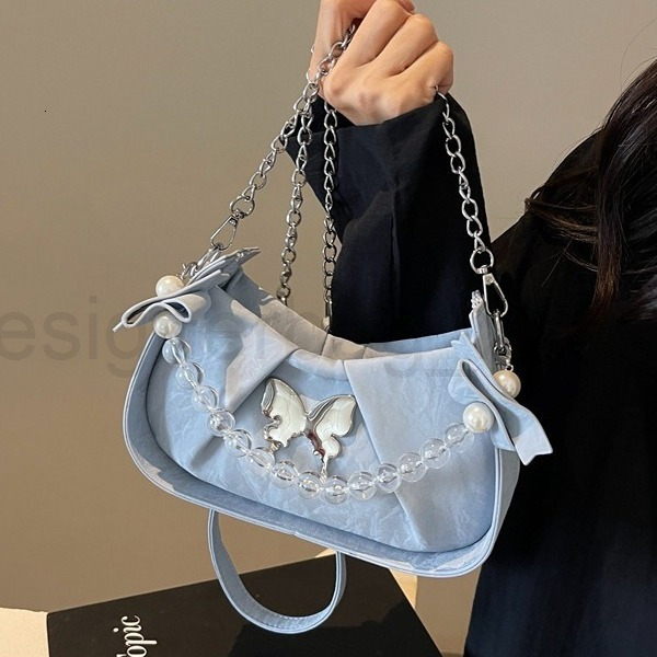 Classic Designer Bag Fashion 10a Top Woman Handbagfashion Canvas Bags French Niche Design Womens Butterfly New Style Stylish and Versatile Chain Cross