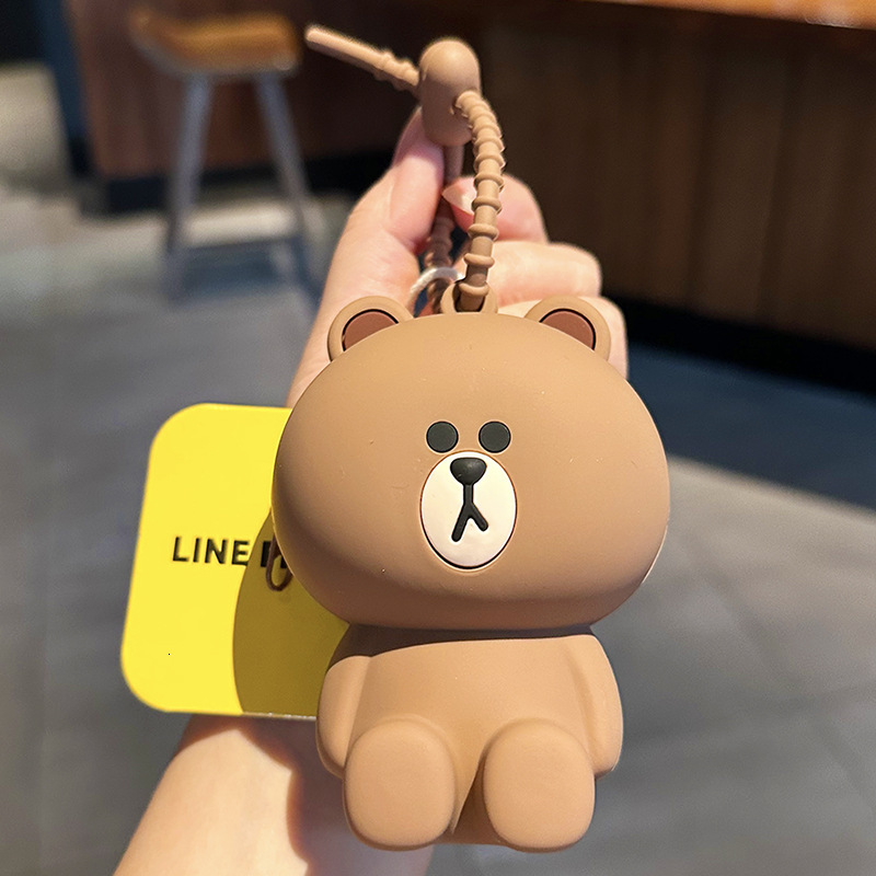 New designer genuine brown bear coin purse cartoon Koni Rabbit mini key creative multifunctional headphone storage bag pendant