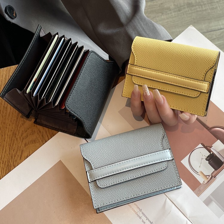 Leather anti magnetic cover layer, cowhide, large capacity, multiple slots, solid color mini card cover, new fashionable and simple leather wallet