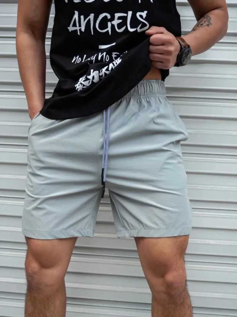 Mens hot shorts lightweight thin shorts running squat fitness shorts mens gym wear fast drying drawstring shortsXJ250407