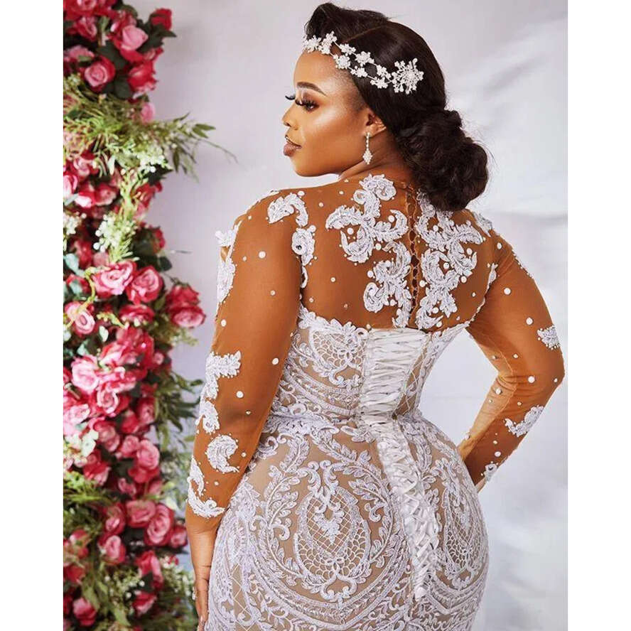 Plus Size Illusion Long Sleeve Wedding Dresses 2022 Sexy African Nigerian Jewel Neck Lace-Up Back Mermaid Applique Bride Gowns