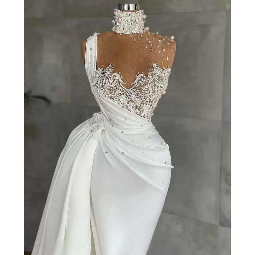 2023 Designer Mermaid Dresses Lace Applique Beaded Pearls Rhies Illusion High Neck Sweep Train Satin Custom Made Wedding Gown Vestido De Novia