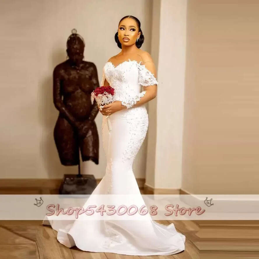2022 Aso Ebi Mermaid Wedding Dresses With Sheer Neck Illusion Long Sleeves Bridal Dress Lace Appliques Pearls Vestido De Noiva