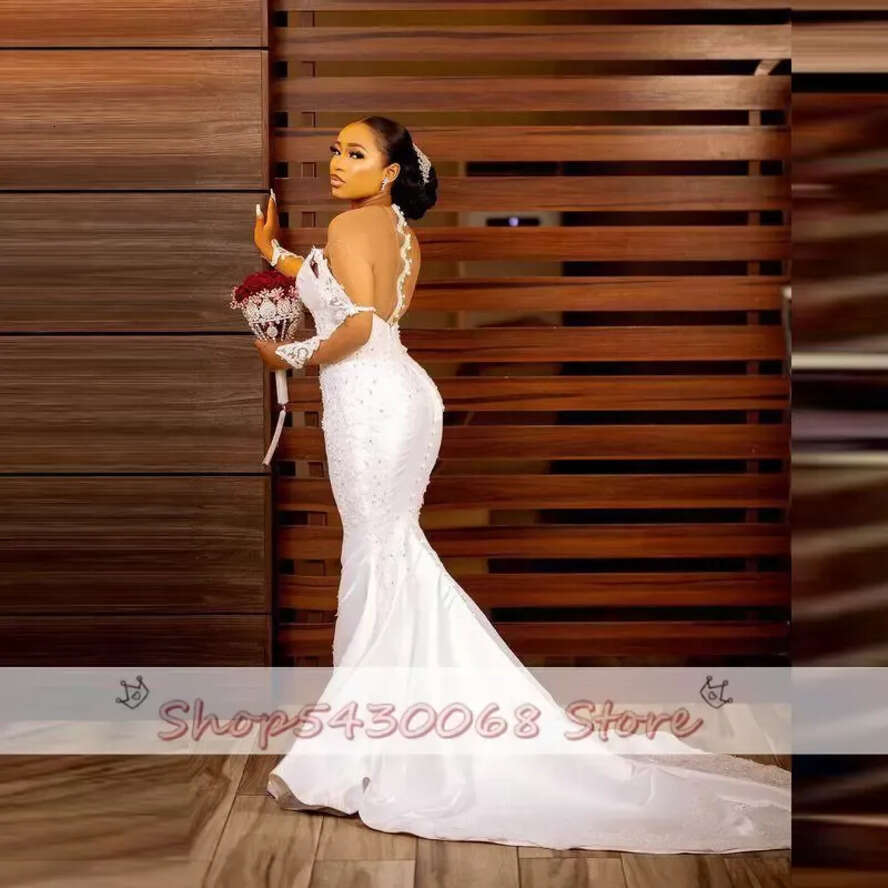 2022 Aso Ebi Mermaid Wedding Dresses With Sheer Neck Illusion Long Sleeves Bridal Dress Lace Appliques Pearls Vestido De Noiva