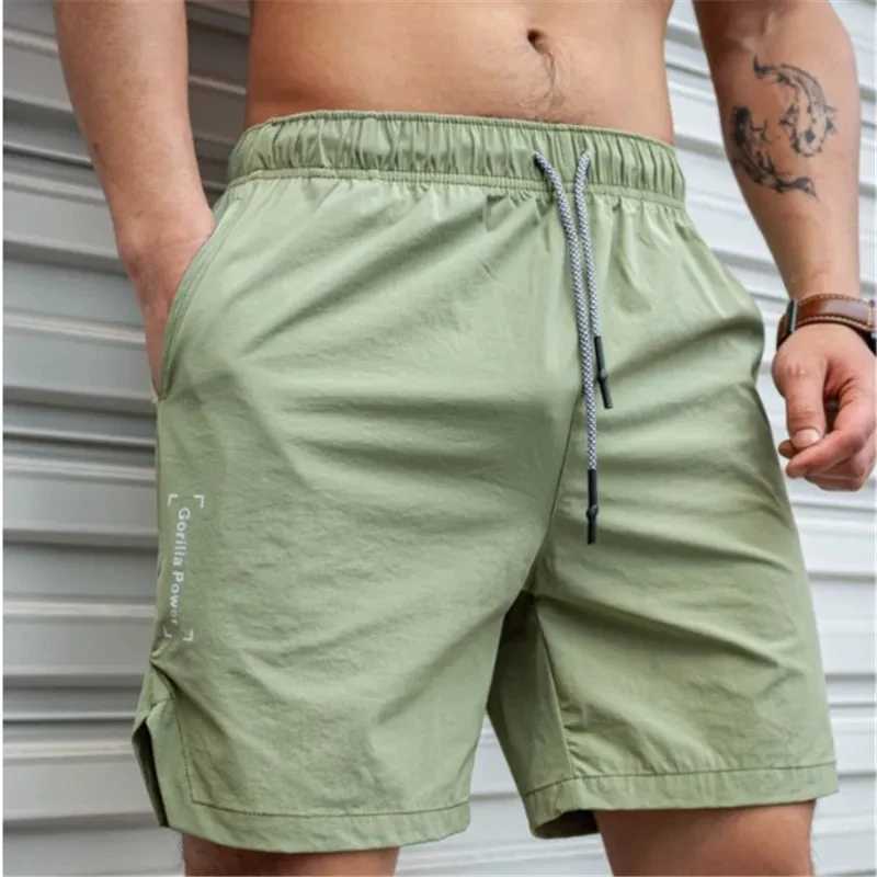 Mens hot shorts lightweight thin shorts running squat fitness shorts mens gym wear fast drying drawstring shortsXJ250407