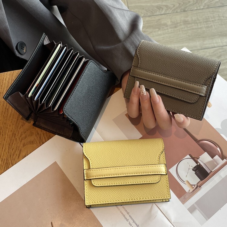 Leather anti magnetic cover layer, cowhide, large capacity, multiple slots, solid color mini card cover, new fashionable and simple leather wallet