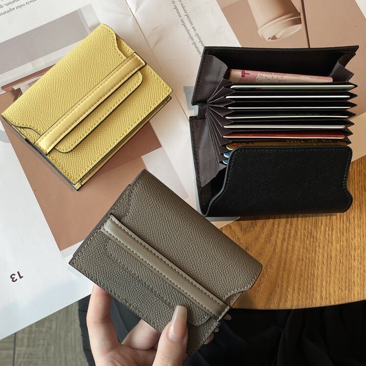Leather anti magnetic cover layer, cowhide, large capacity, multiple slots, solid color mini card cover, new fashionable and simple leather wallet