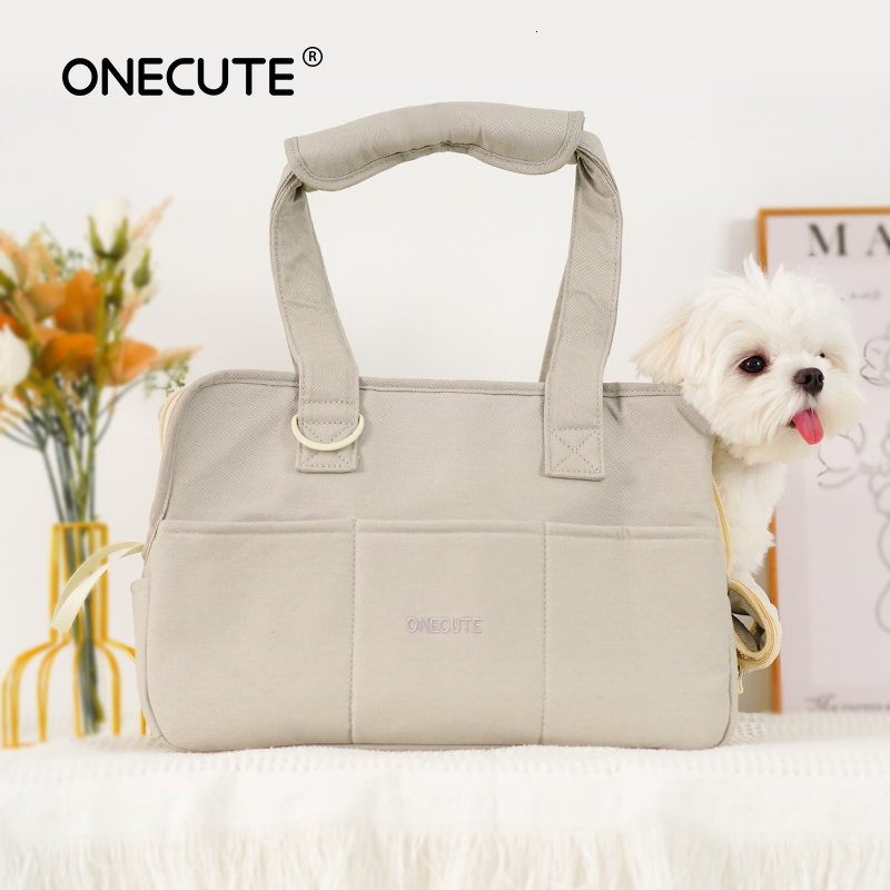 Portable breathable designer shoulder bag for small dogs when going out, suitable for carrying pet cats, children, and dogs