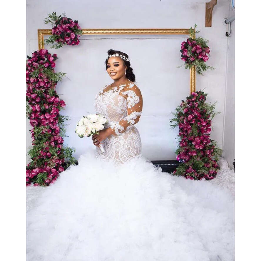 Plus Size Illusion Long Sleeve Wedding Dresses 2022 Sexy African Nigerian Jewel Neck Lace-Up Back Mermaid Applique Bride Gowns