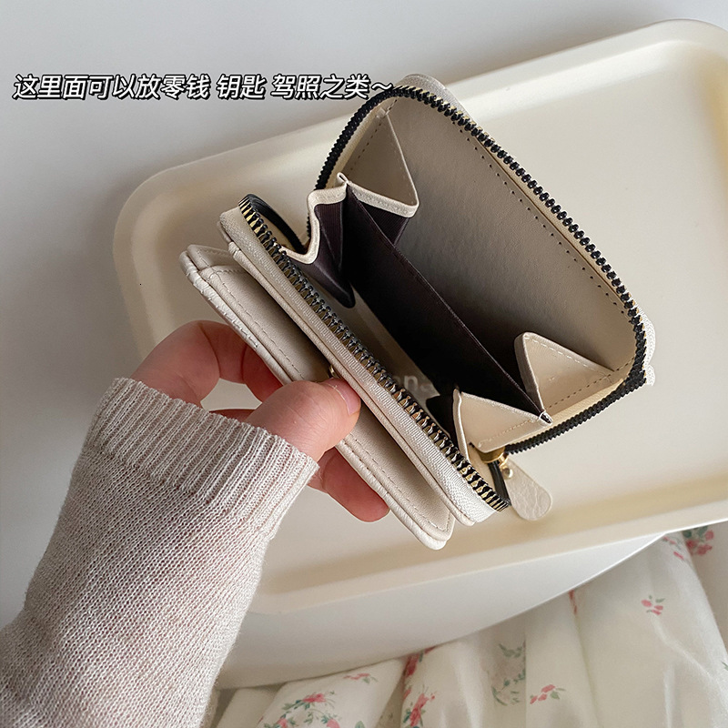 Minimally designed women's exquisite mini multifunctional wallet with large capacity card bag and foldable small coin purse