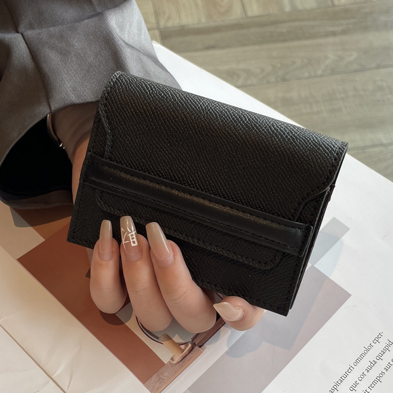 Leather anti magnetic cover layer, cowhide, large capacity, multiple slots, solid color mini card cover, new fashionable and simple leather wallet