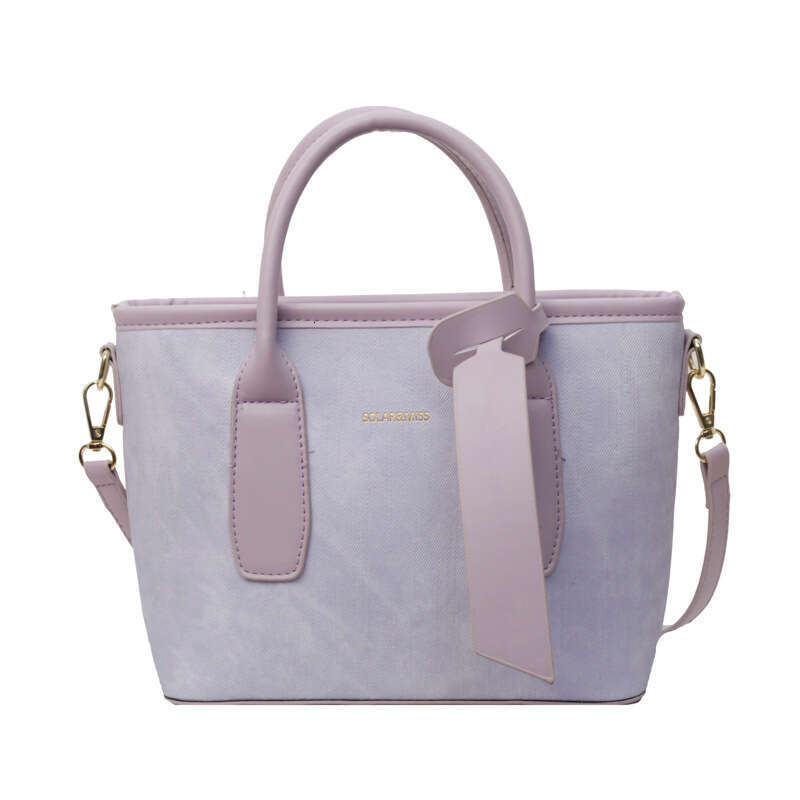 Crossbody women's new style fashionable single shoulder hand-held bucket bag, popular for work and commuting this year
