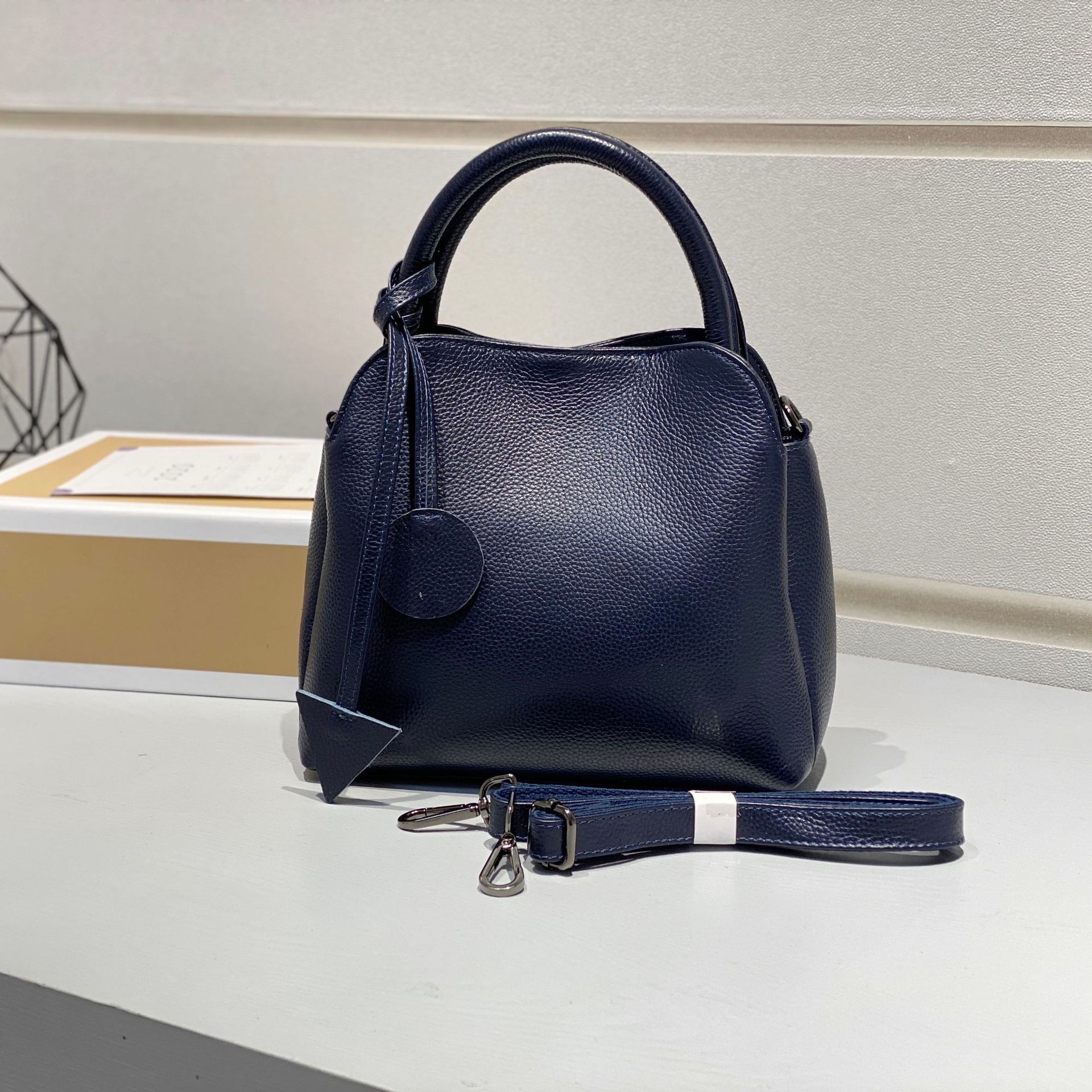 Designer's new top-level cowhide leather women's handheld crossbody bag fashion bag