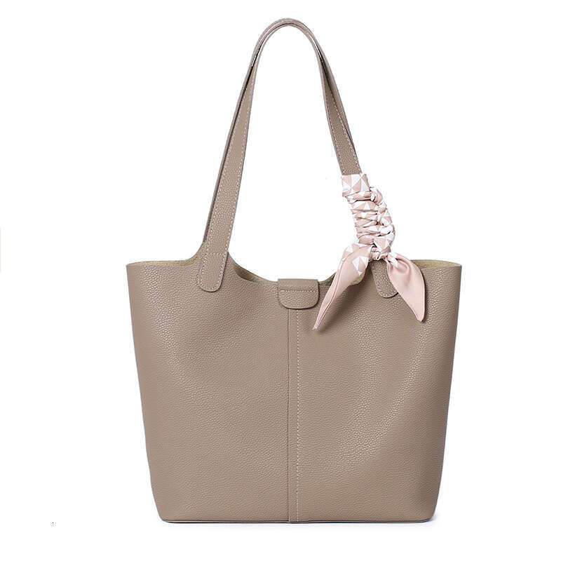 womens 2024 new genuine leather women's high-end and niche handbag, one shoulder armpit hand-held baozi mother bag, large capacity tote bag