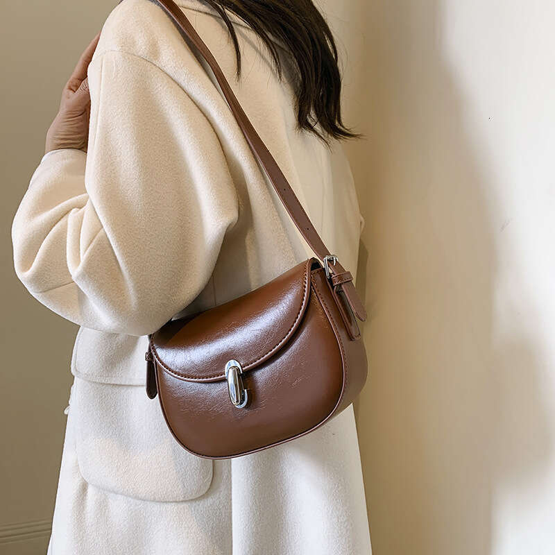Women's 2024 new Korean version trendy ins fresh and cute armpit soft leather tote crossbody fashion bag