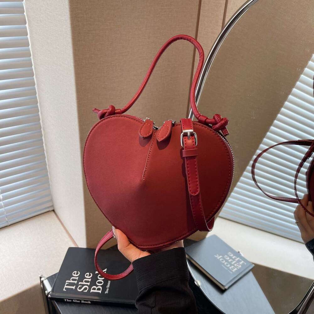 Women's autumn and winter popular suede hand-held 2024 new fashion niche frosted heart-shaped bag texture crossbody