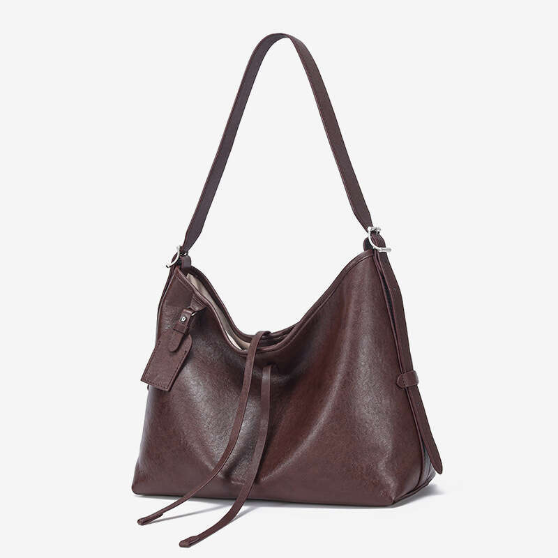 new Tote bag large capacity genuine leather 2024 autumnwinter new crossbody niche design single shoulder armpit women's bag