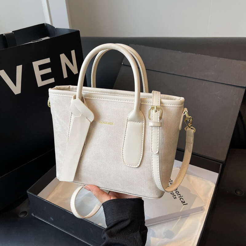Crossbody women's new style fashionable single shoulder hand-held bucket bag, popular for work and commuting this year