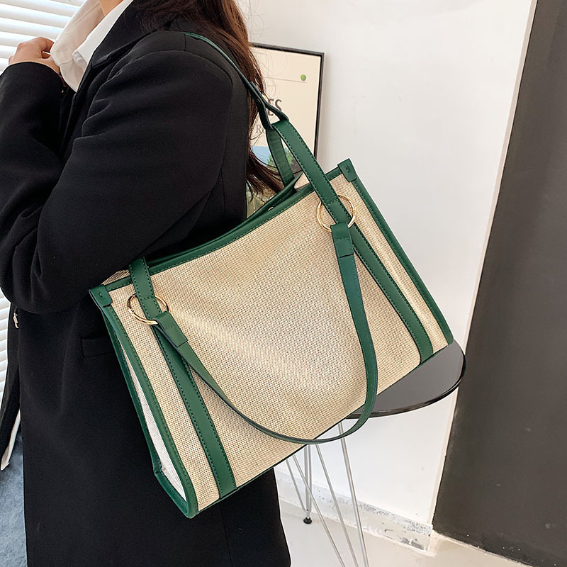 New designer women's large capacity casual shoulder armpit new canvas contrasting handbag fashion bag