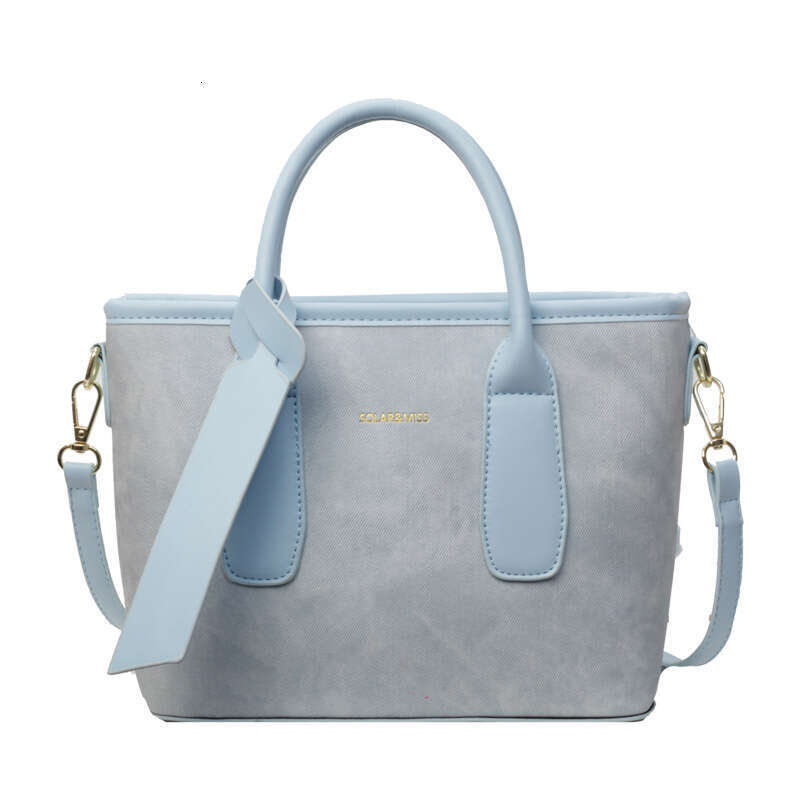 Crossbody women's new style fashionable single shoulder hand-held bucket bag, popular for work and commuting this year