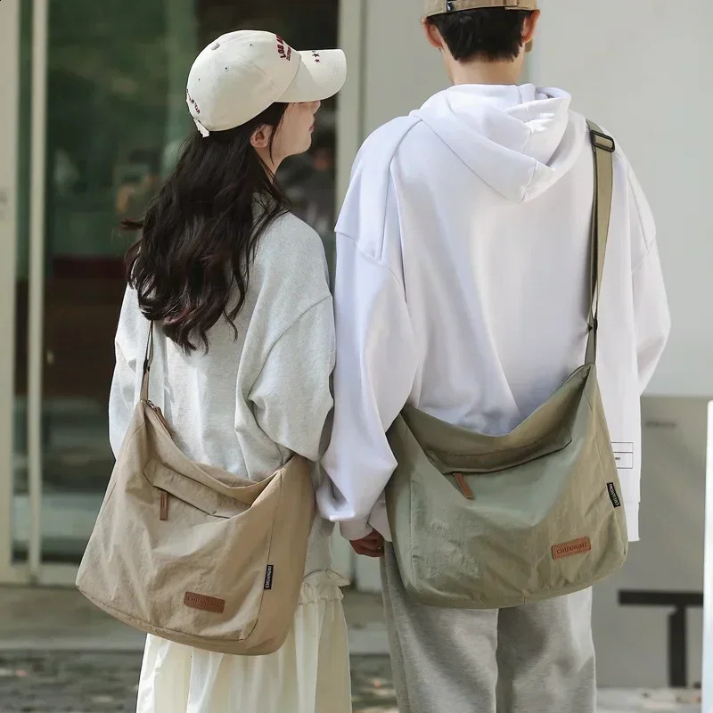Womens shoulder cross body large canvas student messenger bag Japanese backpack womens handbag 241105